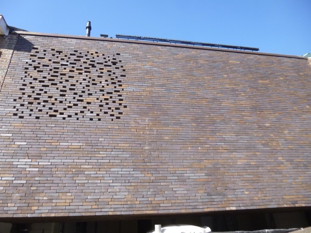 Werf Roeselare - dakwerk in dunbed metselwerk
